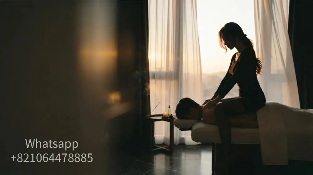 A private massage atmosphere with warm light and relaxed surroundings.