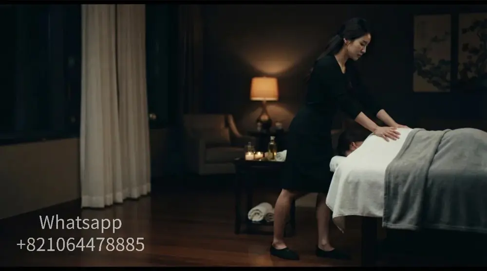 A calm hotel-room setting for an evening massage visit.