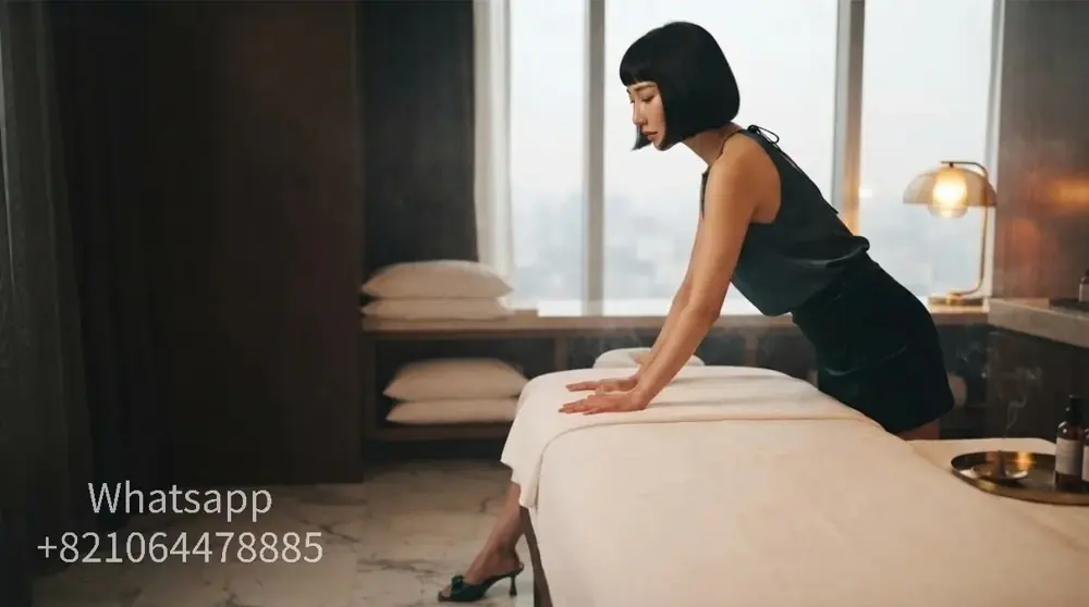 A private massage atmosphere with warm light and relaxed surroundings.