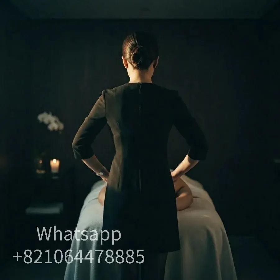 A calm hotel-room setting for an evening massage visit.